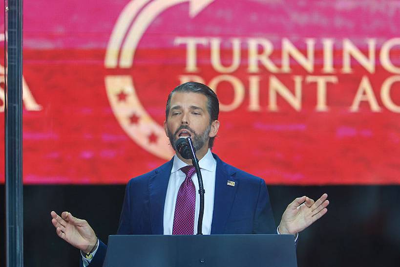 Donald Trump Jr. pokes fun at his father at Charlie Kirk's funeral. 
